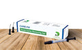 Beetle Dental CARIE FIX box with syringe and applicator tips of dental caries removal gel on wood