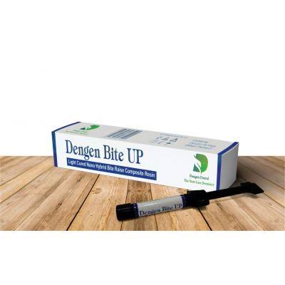 Beetle Dental Dengen Bite UP light cured resin box and syringe applicator on wooden surface for bite raising