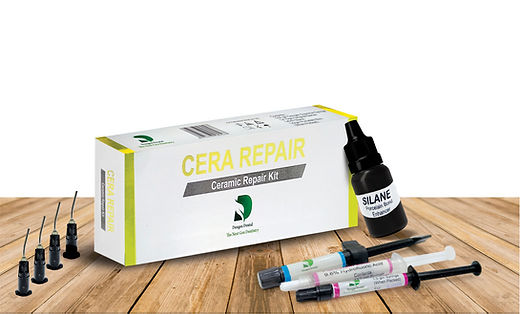Beetle Dental dental ceramic repair kit box with syringes silane bottle and applicator tips on wooden surface