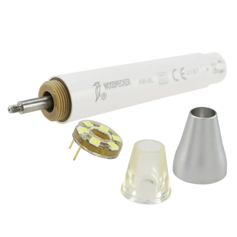 Woodpecker ultrasonic scaler handpiece with LED PCB and clear and silver tip caps on white background