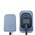 Beetle Dental silicone protective cover for RVG sensors on two gray dental sensors showing cable connection