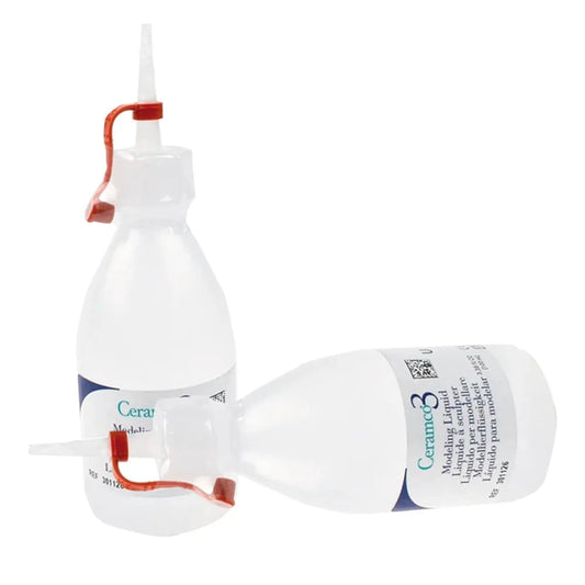 Two bottles of Dentsply Ceramco3 Modelling Liquid with red caps for dental ceramic modeling
