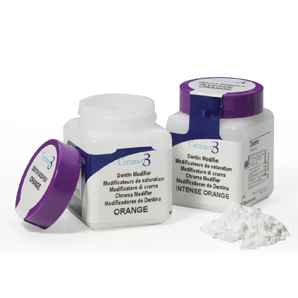 Dentsply Ceramco 3 dentin modifier two white jars with purple lids and spilled orange dentin powder for shading