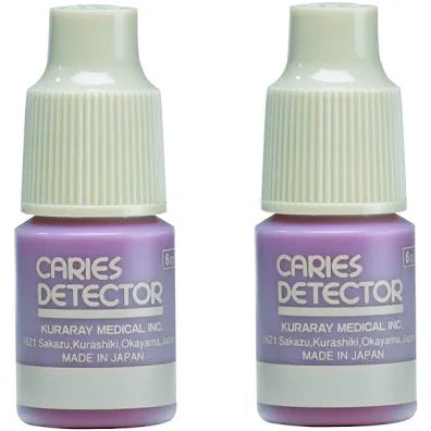 Kuraray Caries Indicator for dentists in purple bottles designed for effective dental diagnosis
