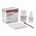 Medicept XtraLute dental cement kit by Beetle Dental with bottle, mixing pad, and applicator brush