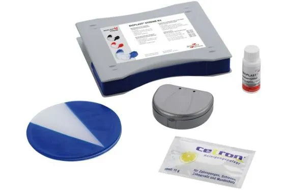 Scheu Bioplast Xtreme dental sheets kit showing blue white sheet forming plate metal mold and accessory kit