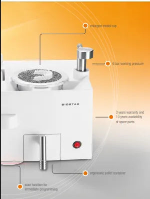 Close up of white Scheu Biostar dental pressure forming machine showing control panel and pellet container