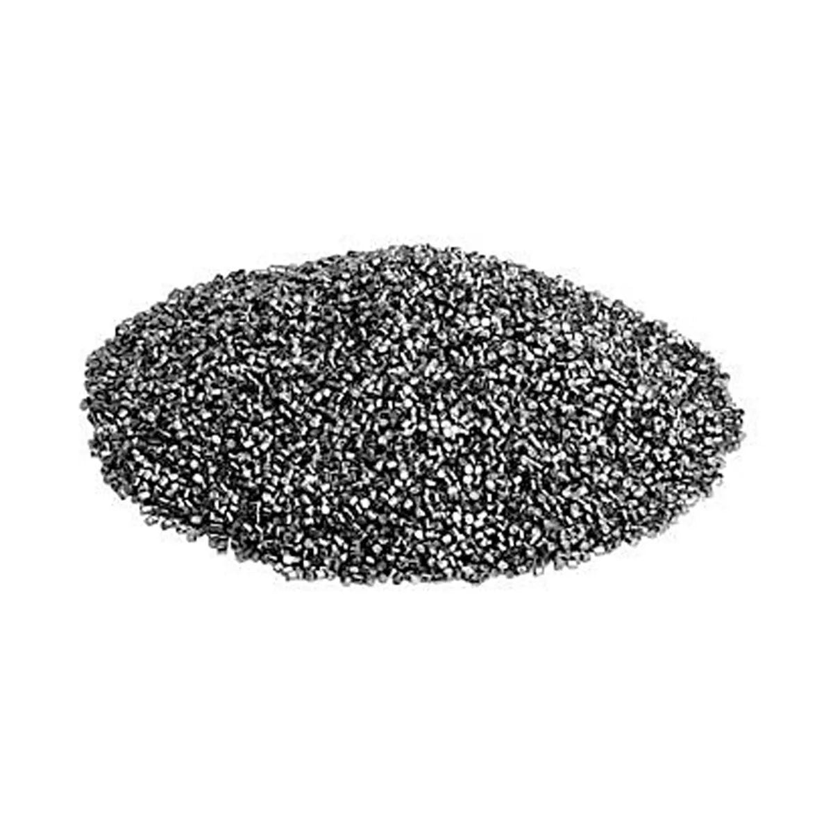 Pile of metallic granular pellets on white background for dental lab use Scheu stainless steel pellets 1 kg