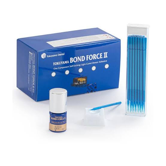 Tokuyama Bond Force II kit with adhesive bottle and application tips for dental bonding