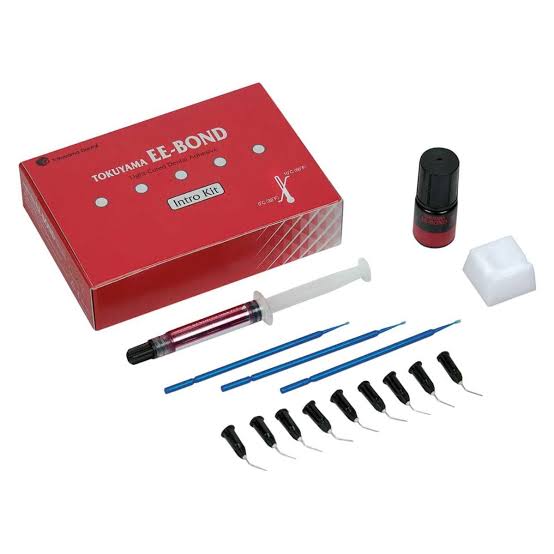 Tokuyama EE Bond Kit with adhesive syringe and applicators for dental bonding procedures