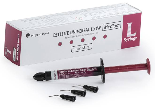 Tokuyama Estelite Universal Flow dental composite syringe with tips and packaging for dental procedures