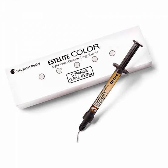 Tokoyama Estellite Color Flowable Composite in a 0.5ml syringe with packaging for dental use