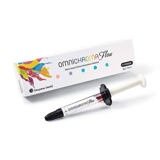 Tokuyama Omnichroma Flow dental composite syringe with colorful packaging for dental restoration