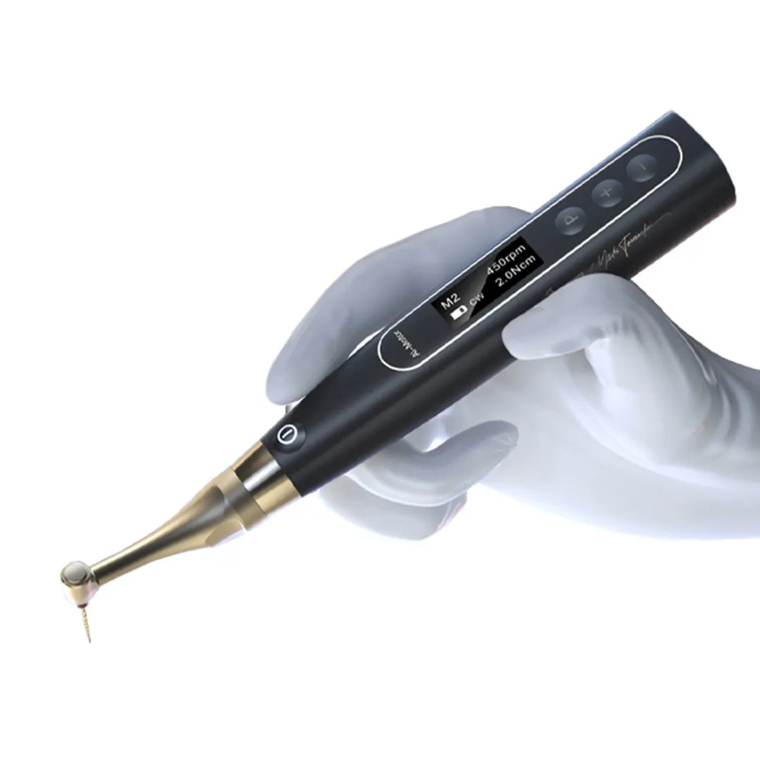 Beetle Dental woodpecker ai endomotor with apex locator held in gloved hand with contra angle and endodontic file