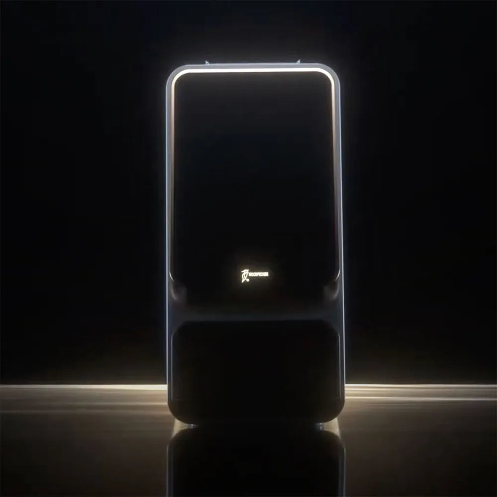 Woodpecker i-Scan dental scanner black illuminated desktop scanner with glowing outline and logo