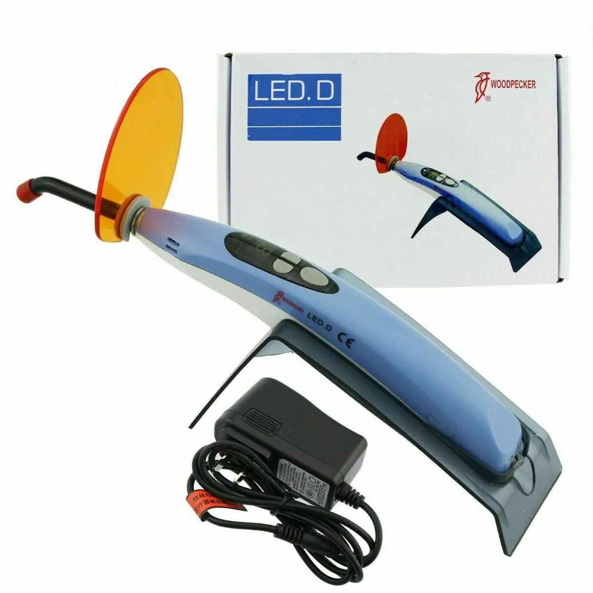 Beetle Dental Woodpecker LED D curing light with orange protective shield charger stand and power adapter