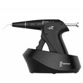 Woodpecker obturation gun in black with ergonomic pistol grip and charging base for dental root filling