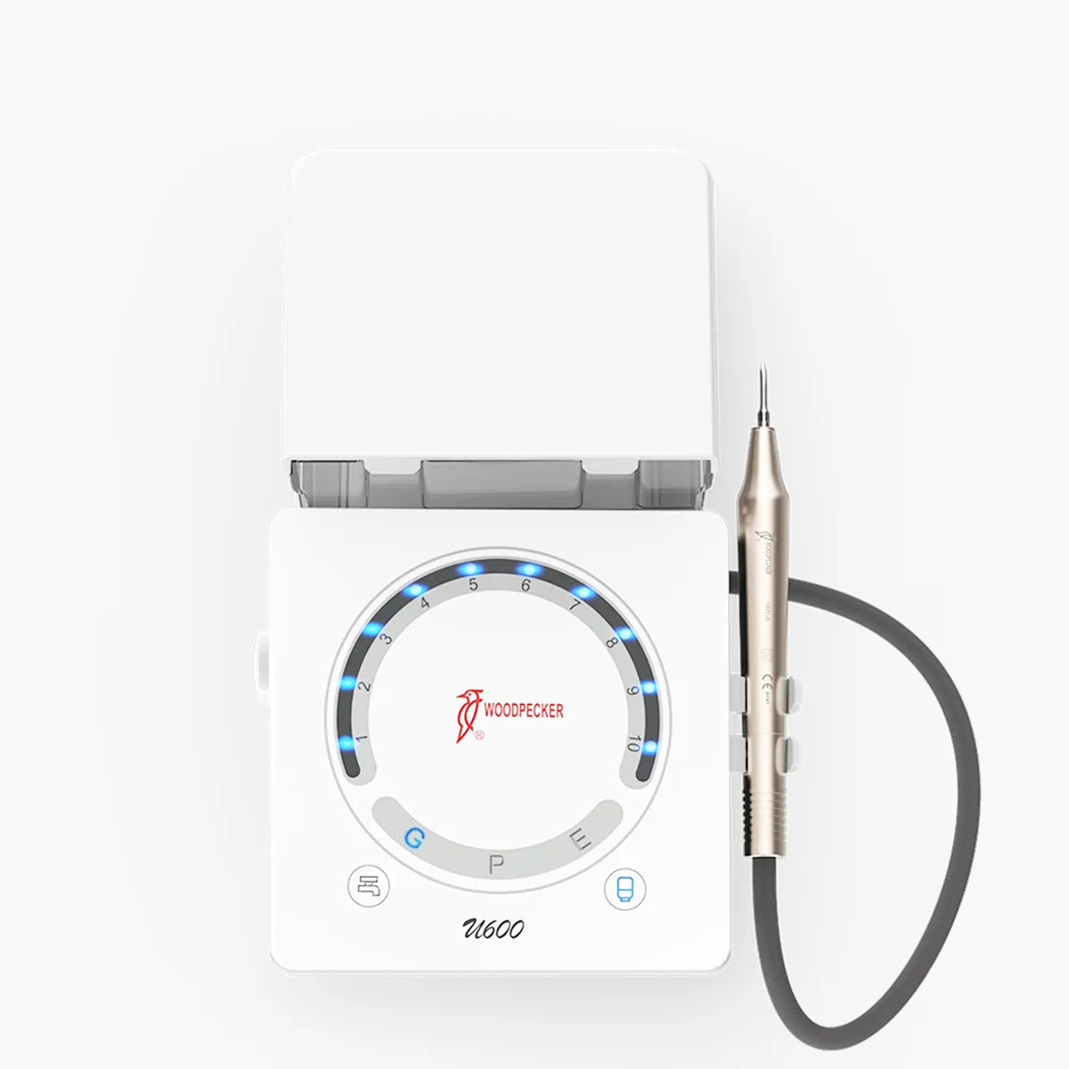 White dental unit top view with metallic handpiece and dial LED lights Woodpecker U-600 LED ultrasonic scaler